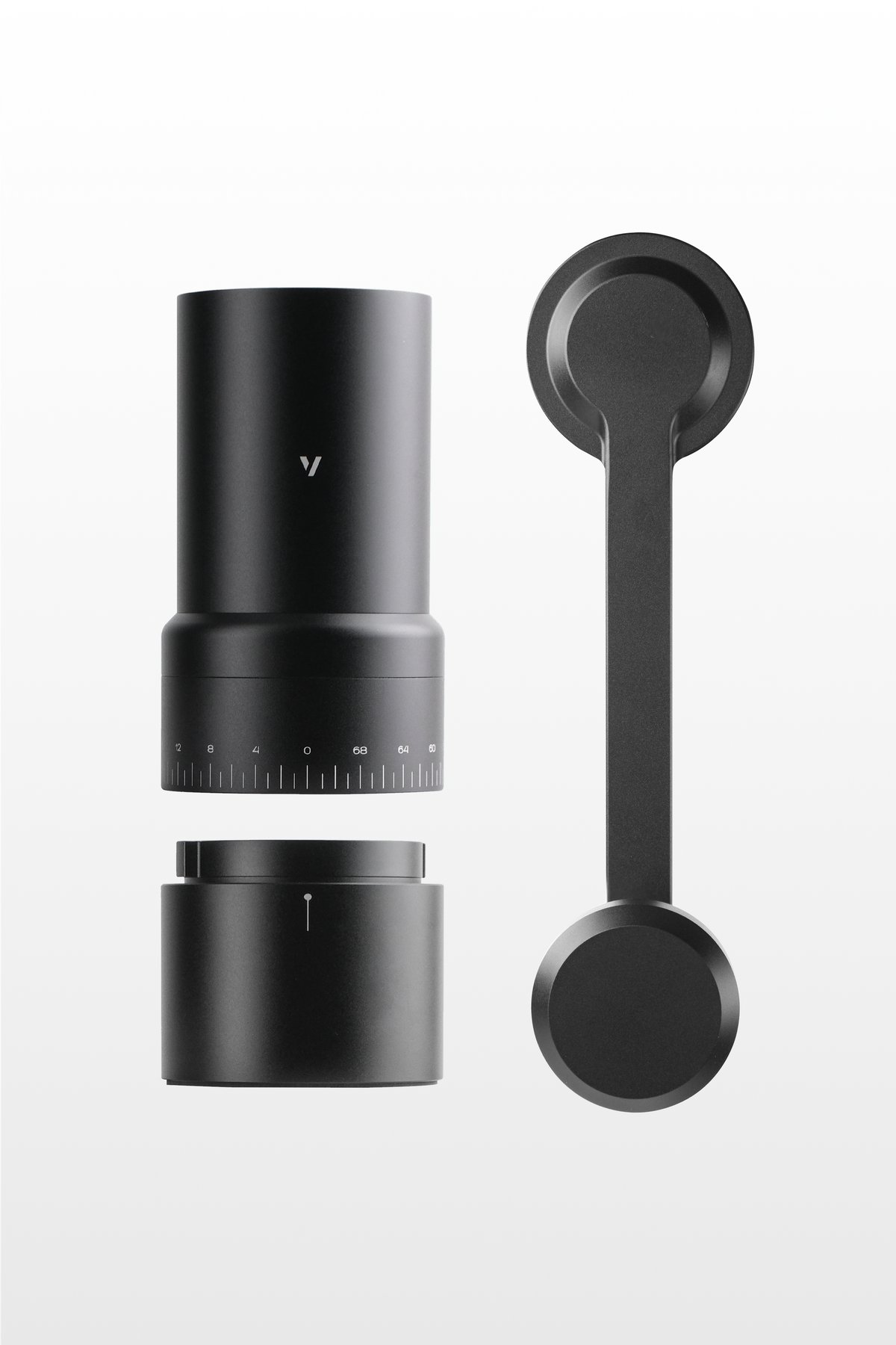 The grinder, catch cup and magnetic hand crank.