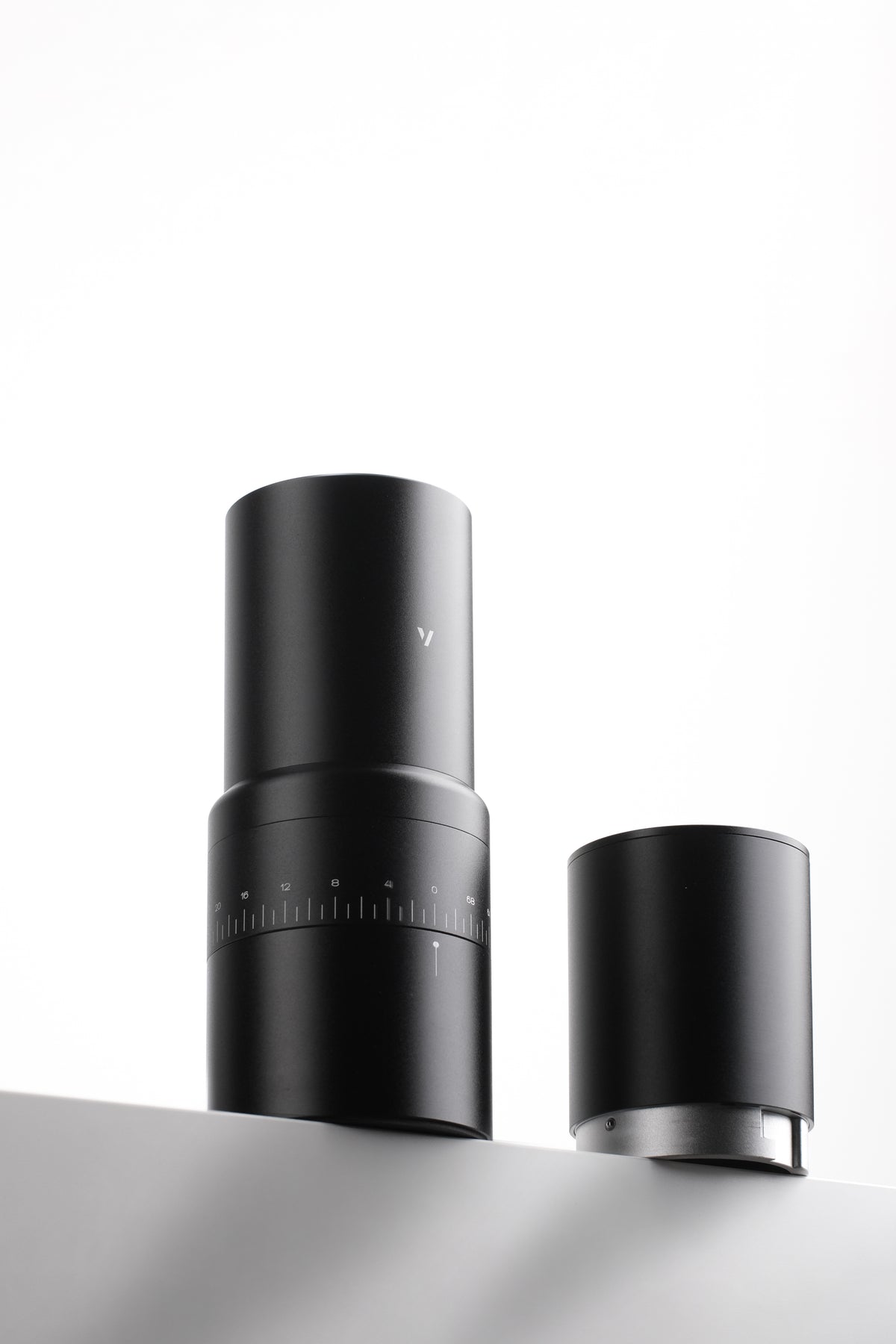 The grinder body and removable catch cup.