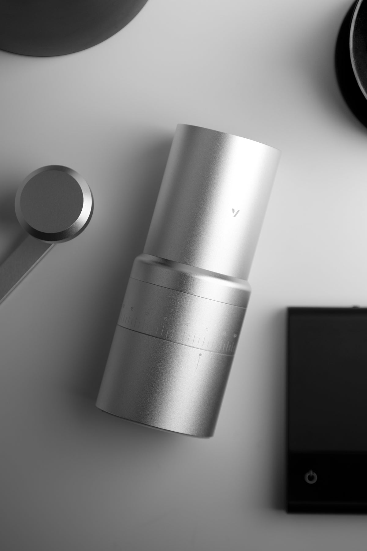 Current silver EVO Hand showing the adjustment collar and detached hand crank