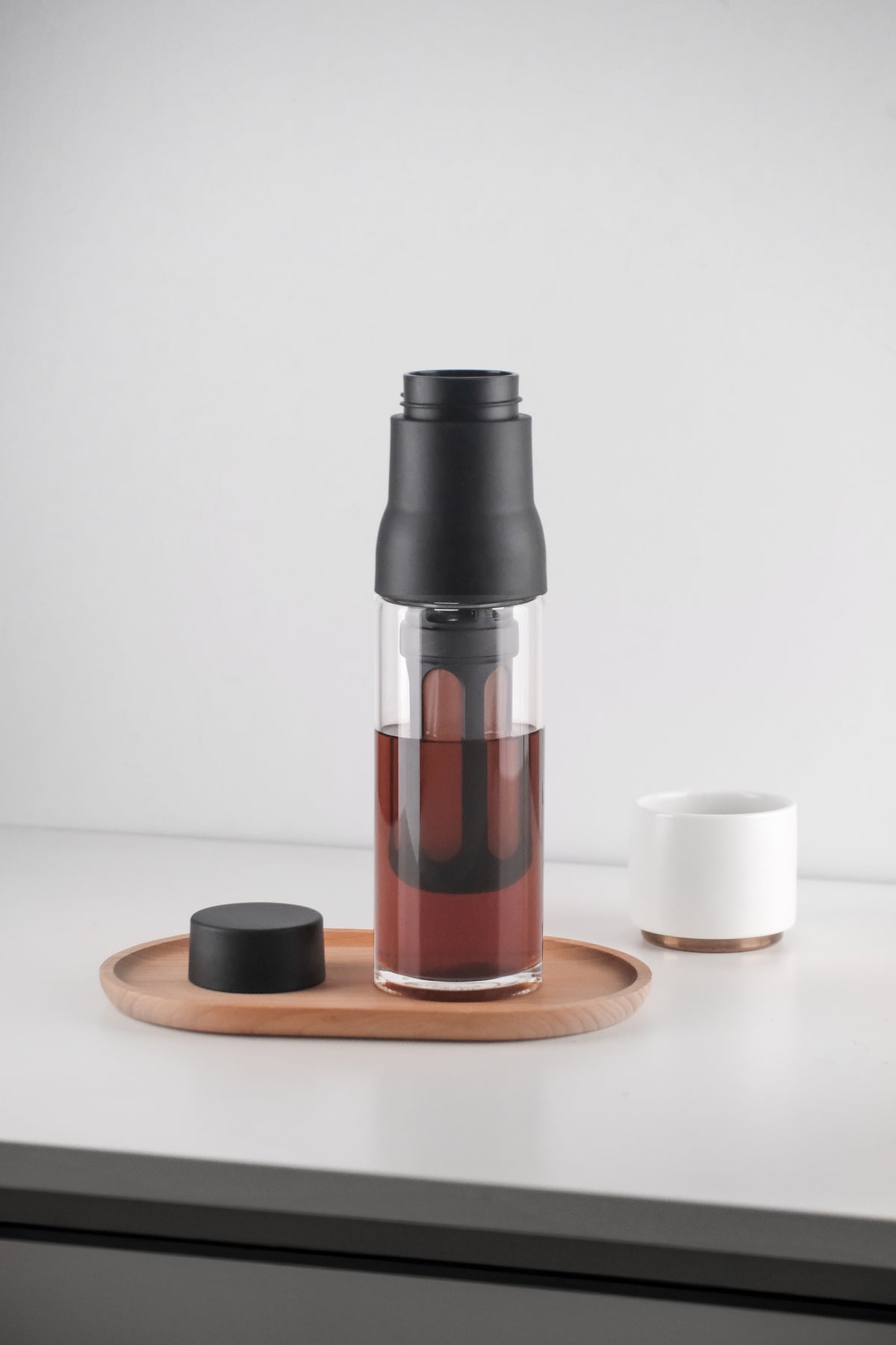Pouring a taste from the STEEP cold brew bottle