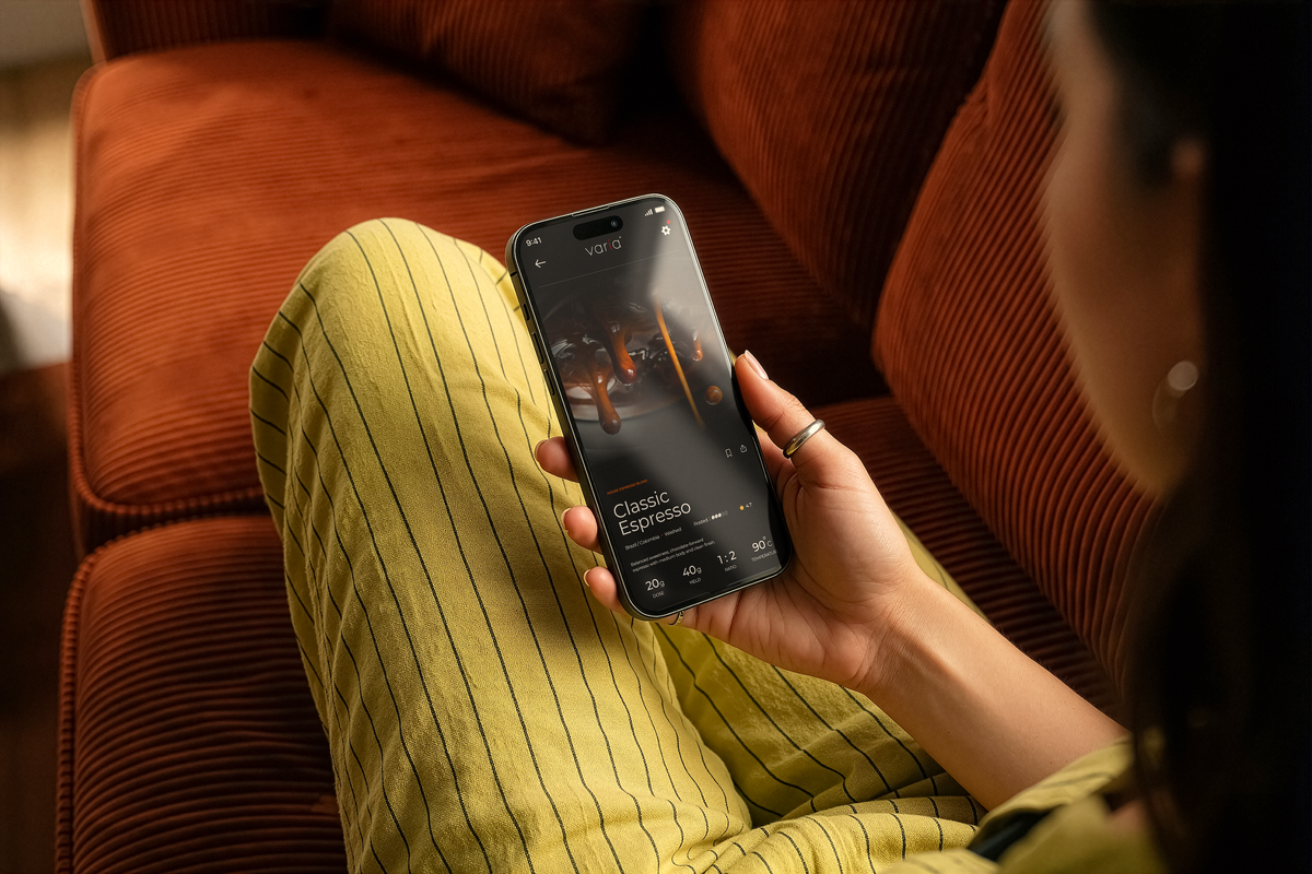 Varia app displaying the Classic Espresso recipe on a phone held at home